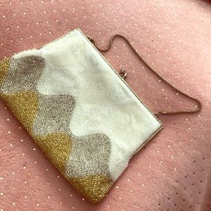 Beautifully beaded hand held clutch